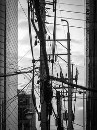 Low angle view of electricity pylon