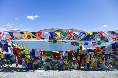 Colourful prayer flags near pangong lake. the tourist landmark lake in leh ladakh. india.