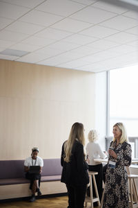 Businesswomen talking during coffee break