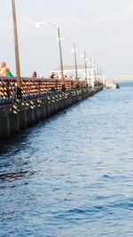 View of pier over calm sea