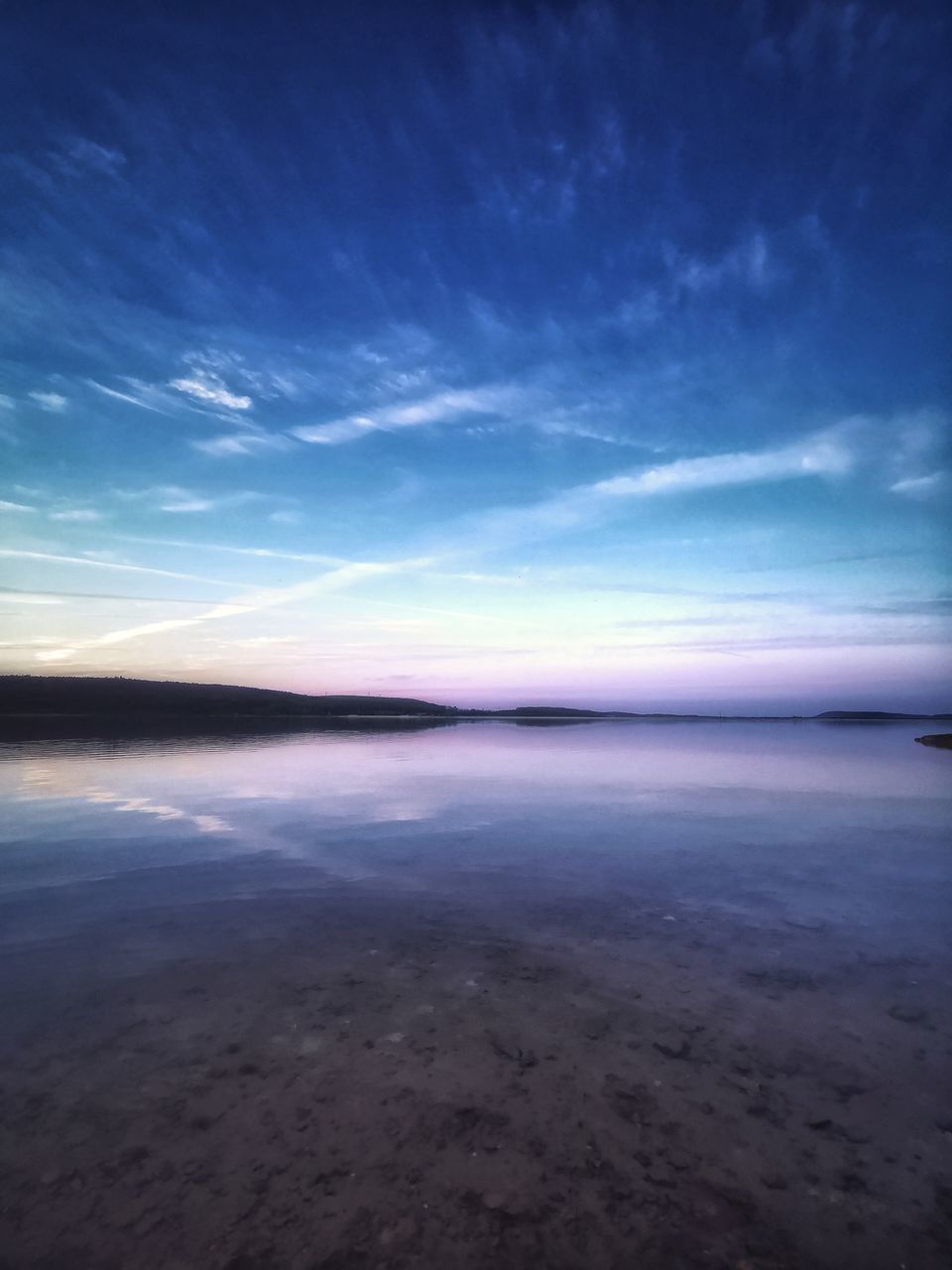 SCENIC VIEW OF SEA AGAINST BLUE SKY