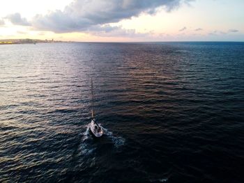 High angle view of sea against sky during sunset