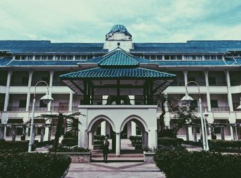 Facade of historic building against sky