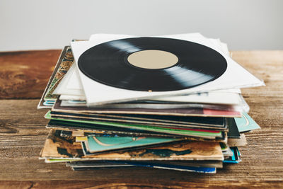 Stack of vinyl records. listening to music from lp record. playing music from analog disk. vintage