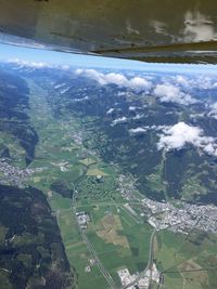 Aerial view of agricultural field against sky