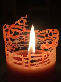 Close-up of burning candle