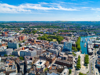 High angle view of buildings in city against sky