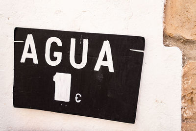 Close-up of text on wall