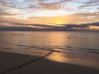 Scenic view of sea at sunset