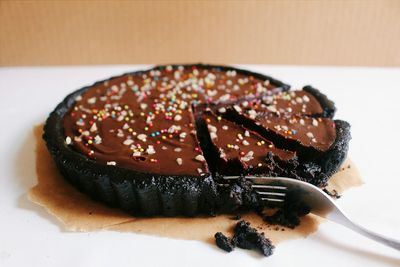 Close-up of homemade chocolate cake on table