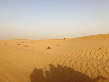 Scenic view of desert against clear sky