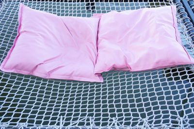 High angle view of pink fabric on table