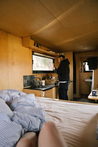 Man preparing coffee in motor home