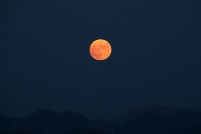 Scenic view of moon against sky at night