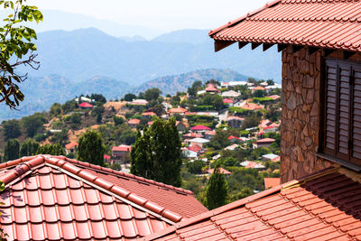 Red roofs of sunny cyprus houses in summer