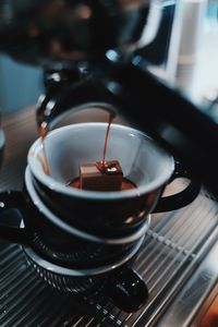 Close-up of coffee cup on table