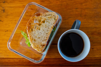 High angle view of coffee cup on table