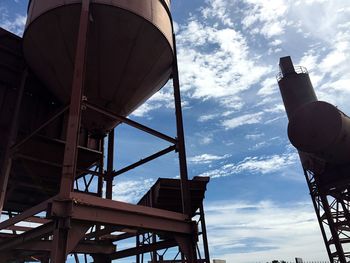 Low angle view of metallic structure against sky