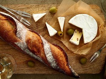 High angle view of bread on cutting board