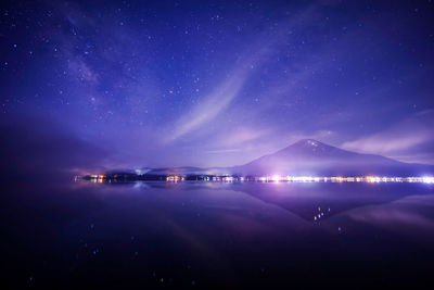 Scenic view of sea against sky at night