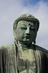 Close-up of statue against sky