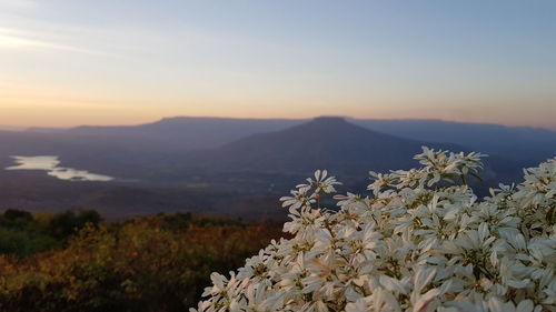 Scenic view of mountains against sky during sunset