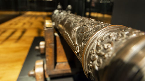 Close-up of metal on table