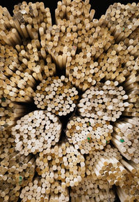 Full frame shot of firewood for sale in market
