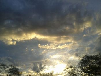 Low angle view of dramatic sky during sunset