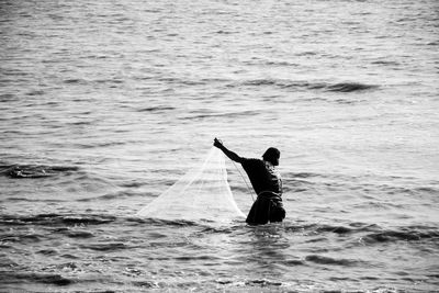 Man surfing in sea