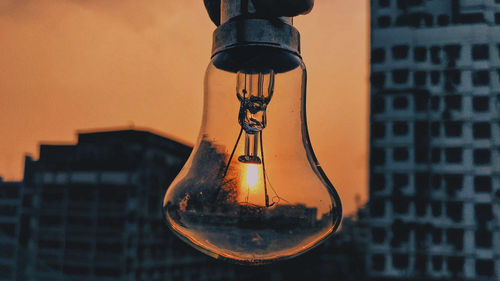 Close-up of illuminated light bulb