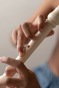 Cropped hand of person with nail polish