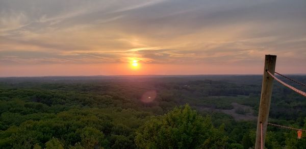Scenic view of landscape against sky during sunset