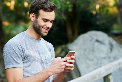 Young man using mobile phone