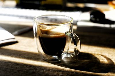 Close-up of coffee cup on table