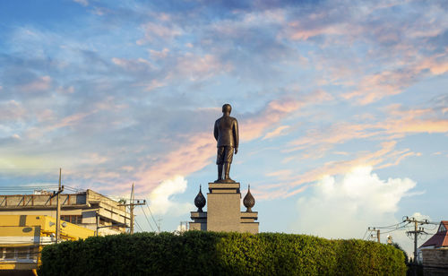 Statue against sky during sunset