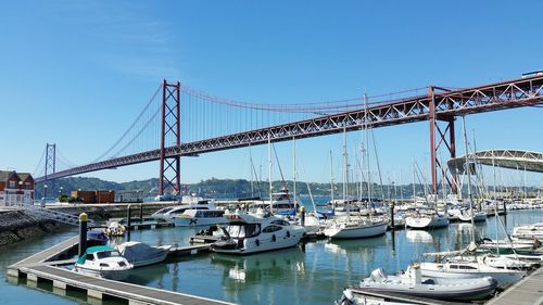 Boats moored at harbor