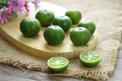 Close-up of green fruits on table