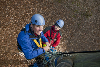 High angle view of man with umbrella