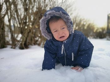 Portrait of cute girl in snow