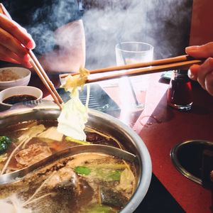 Close-up of man preparing food