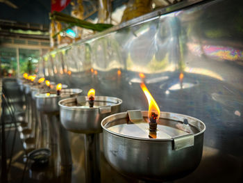 Close-up of illuminated candle