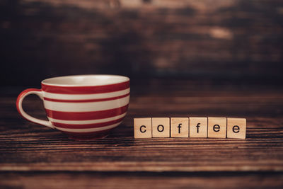 Close-up of coffee cup on table