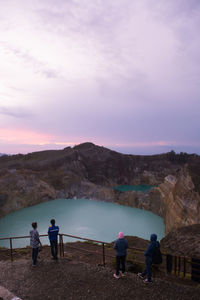 Tourists who are waiting for the sunrise at lake kelimutu, flores