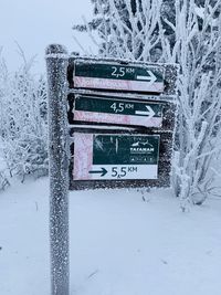 Text on snow covered land