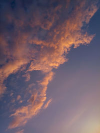 Low angle view of dramatic sky during sunset