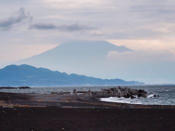 Scenic view of beach against sky