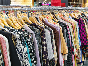 Stylish women shirts on rack for sale at department store