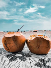  fresh coconut served on the beach for two. 