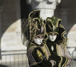 Women wearing masks during carnival